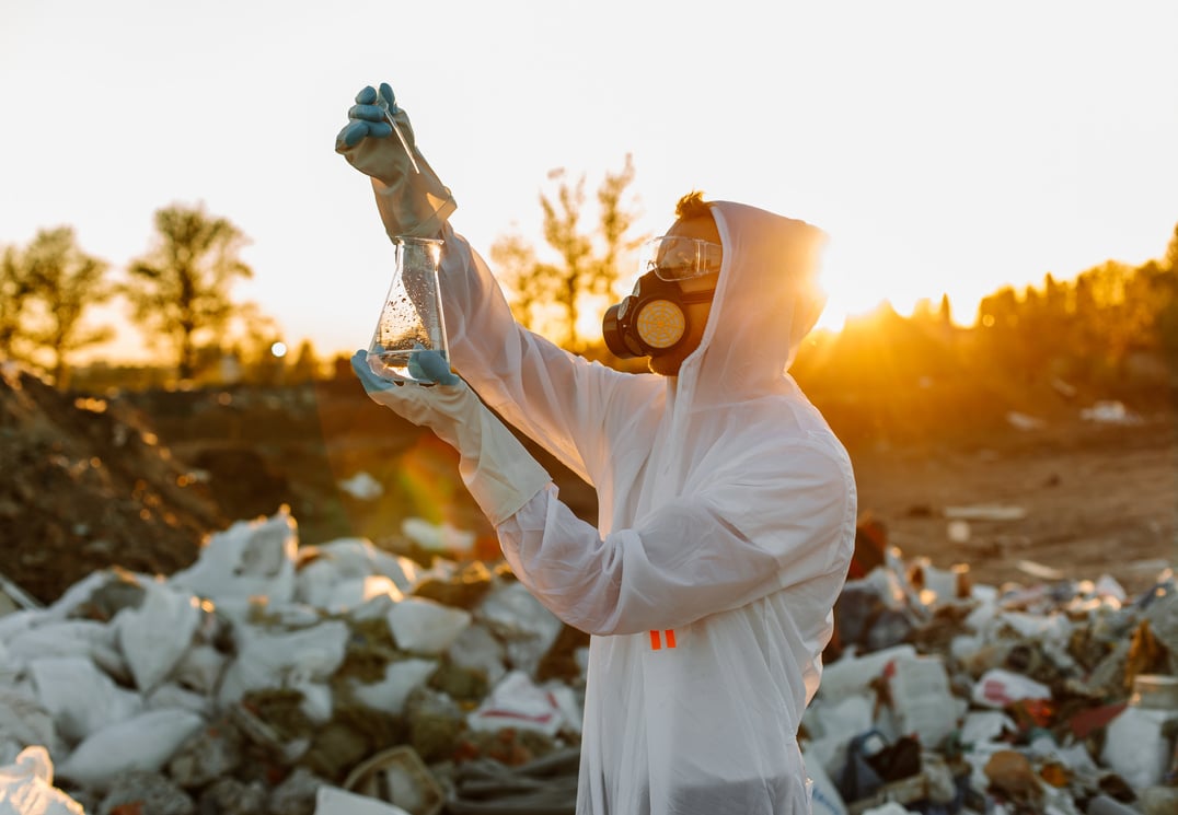 Environmental Researcher Analyzing a Plastic Landfill